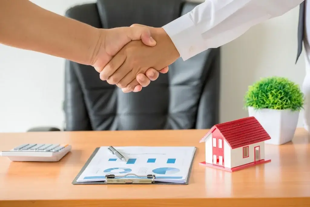 Buy, Sell & Invest in Property | Real Estate Experts in Mumbai, Karjat & Igatpuri – Jishnu Realtorsshands agent client shaking hands after signed contract buy new apartment 1 1024x683 1